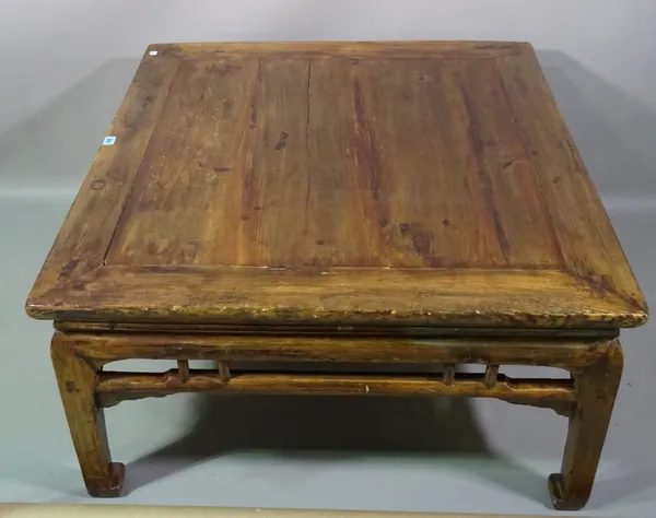 An early 20th century Chinese hardwood low table on block supports, 98cm wide x 54cm high.  G7