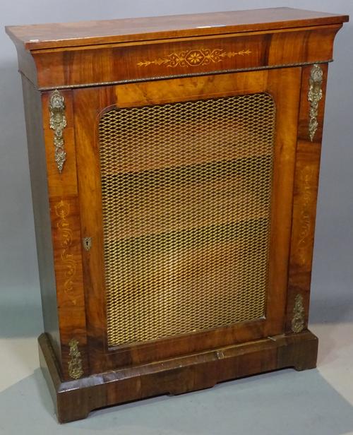 A Victorian gilt metal mounted marquetry inlaid walnut single door pier cabinet on plinth base, 81cm wide x 104cm high x 31cm deep.   BAY 3