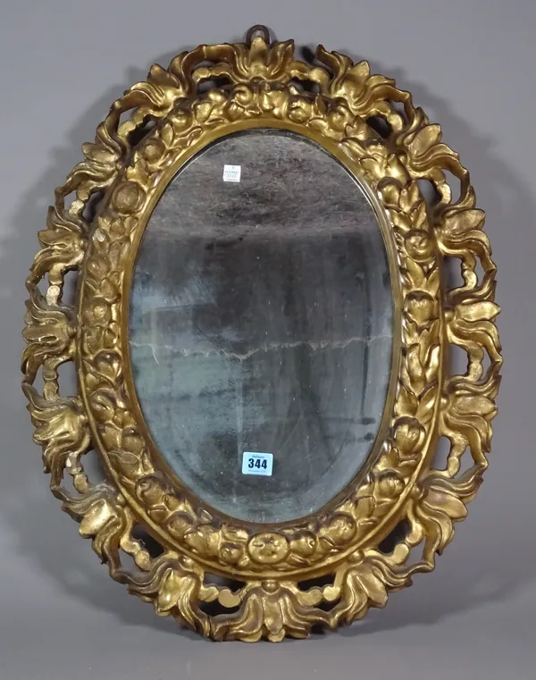 A 19th century Italian gilt framed mirror, with pierced and floral moulded frame, 52cm wide x 68cm high.  A8