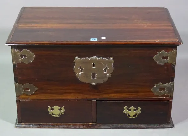 A Chinese hardwood trunk with brass handles and mounts, on ball feet, 79cm wide x 63cm high x 47cm deep.   G7