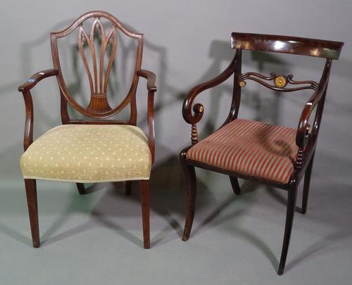 A George III mahogany open armchair with pierced splat back, square front legs and a Regency mahogany open armchair with bar back and sabre supports,