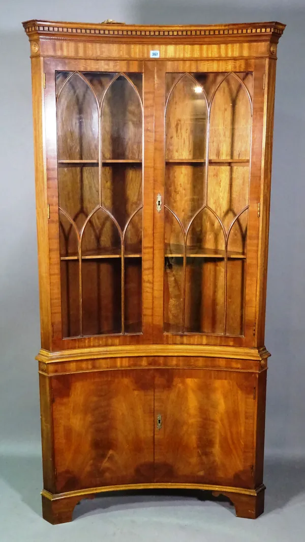 A Regency style floor standing concave corner display cabinet with astragal glazed doors, 83cm wide x 189cm high.   H9