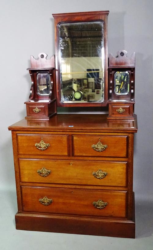 A 19th century mahogany dressing chest of two short and two long drawers on plinth base, 92cm wide x 140cm high.   F6