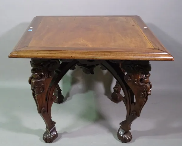 A 20th century Eastern square centre table on four carved supports and paw feet, 90cm wide x 73cm high.    BAY 1