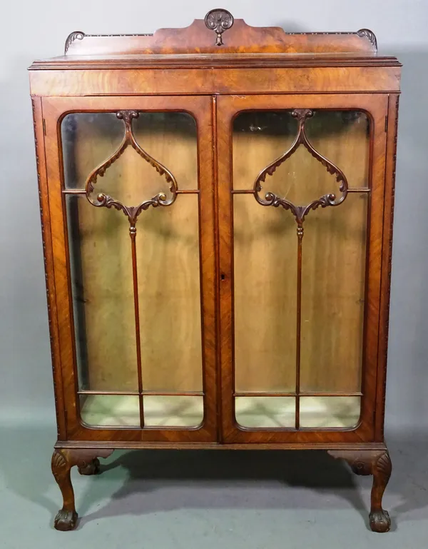 A Victorian mahogany glass two door display cabinet on shell capped ball and claw supports, 87cm wide x 137cm high.  K9