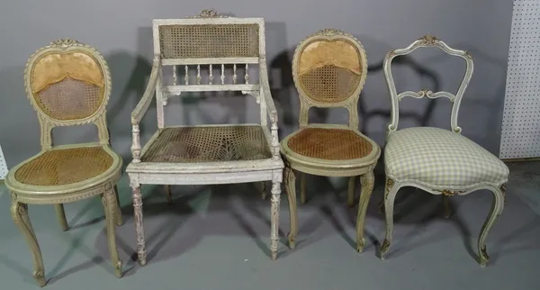 A Louis XVI style white painted open armchair, a pair of French green painted side chairs and another French green and parcel gilt side chair, (4). M8