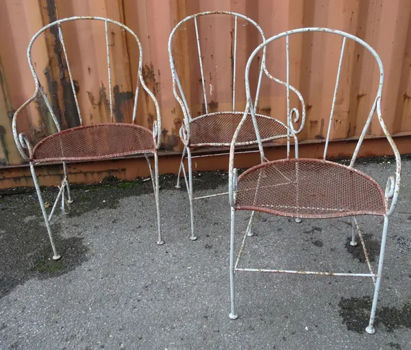 A set of three grey painted wire work metal chairs, (3).   OUT