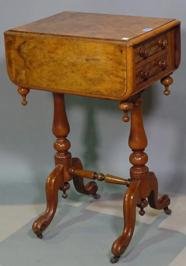A Victorian walnut drop flap two drawer side table on dual tapering supports, 48cm wide x 74cm high.   E4