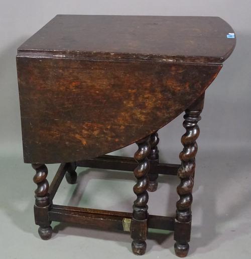 An 18th century and later oak drop flap table on barley twist supports, 51cm wide x 78cm high. J5