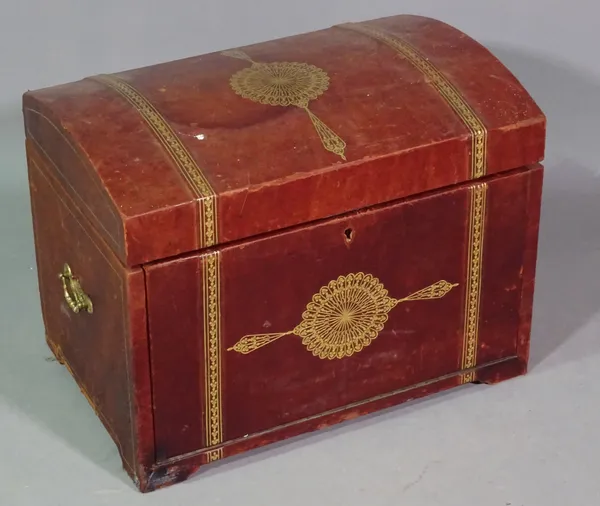 A 20th century red leather domed top trunk, 53cm wide x 40cm high.   J8