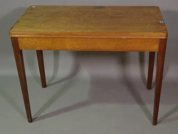 Russell of Broadway; a mid-20th century walnut rectangular centre table on chamfered square supports with pyrographic stamp and Royal Cypher ER 1956,