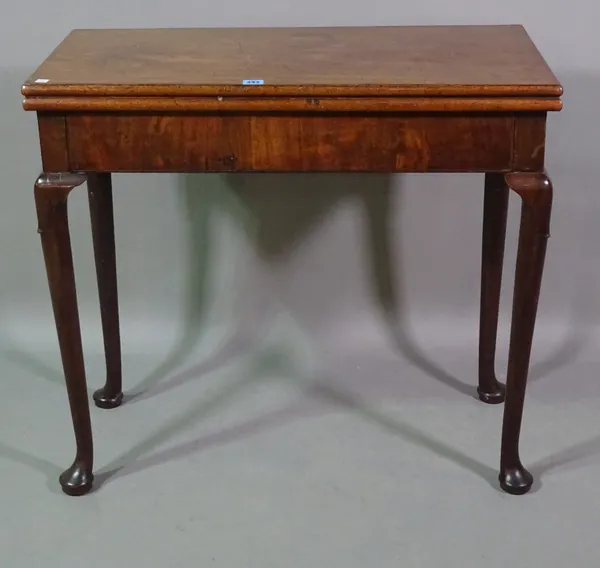 A mid-18th century walnut rectangular tea table, on club supports, 82cm wide x 23cm high x 41cm deep.  BAY 3
