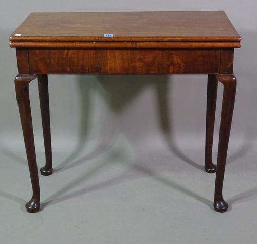 A mid-18th century walnut rectangular tea table, on club supports, 82cm wide x 23cm high x 41cm deep.  BAY 3
