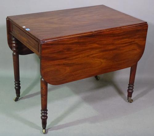 A Regency mahogany Pembroke table, with single frieze drawer on turned supports, 61cm across x 122cm across open x 74cm high x 91cm deep.  H6