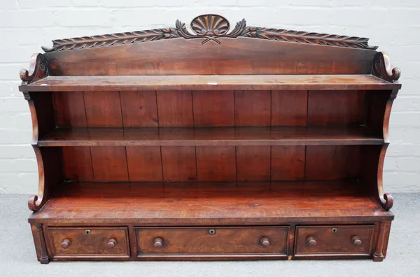 A George IV mahogany three tier bookshelf with three lower frieze drawers, 130cm wide x 86cm high x 32cm deep.  F8