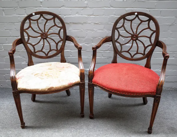 A pair of 20th century "spider web" back open armchairs on tapering square supports, 60cm wide x 95cm high.   C4