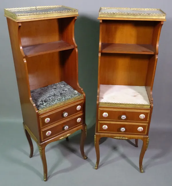 A pair of gilt metal and porcelain mounted two drawer side cabinets on cabriole supports, 121cm high x 31cm deep (2).  G5