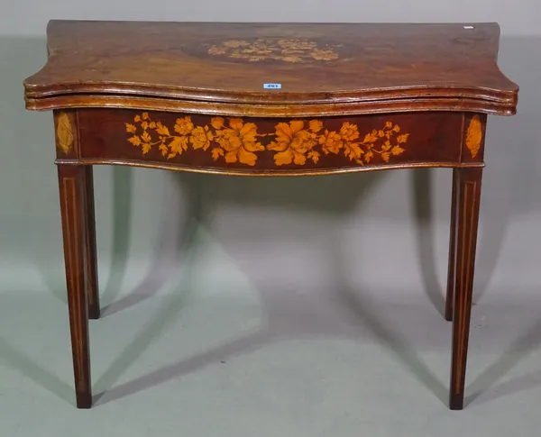 A 19th century Dutch mahogany and floral marquetry inlaid serpentine fold over card table on tapering square supports, 91cm wide x 74cm high.   D4