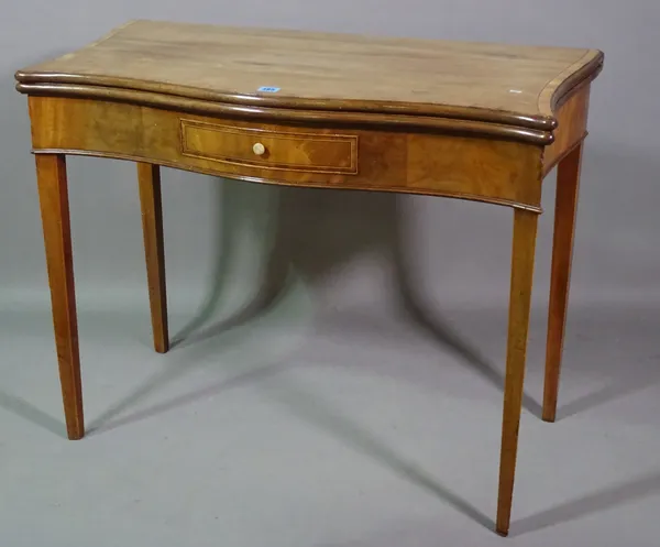 A George III mahogany serpentine foldover tea table with single drawer, 91cm wide x 75cm high.   BAY 3