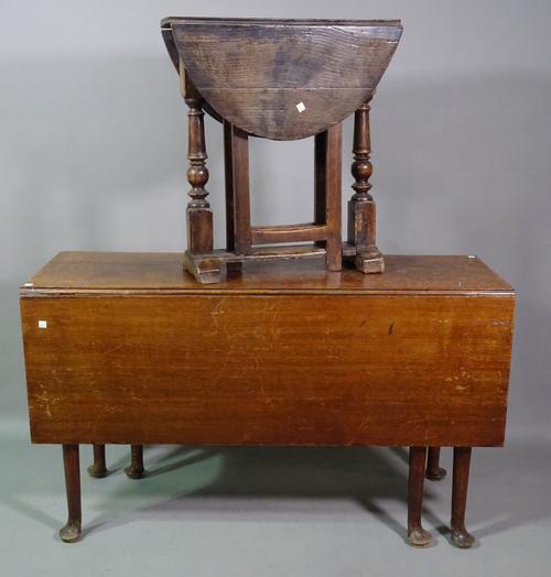 An 18th century and later oak miniature gateleg table, 58cm wide x 65cm high and a 19th century drop flap table on tapering pad feet, 120cm long x 75c