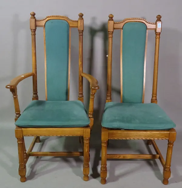 Ercol; a set of eight oak and ash high back dining chairs with teal upholstery, to include two carvers, (8).   F9