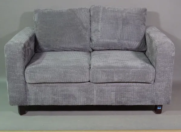 A 20th century small two seater grey upholstered sofa on block supports, 140cm wide.   F4