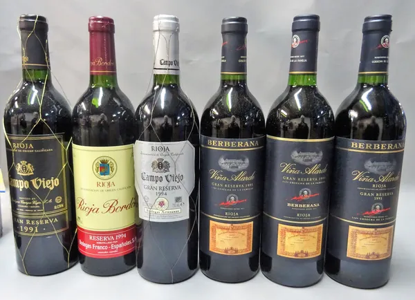 Twelve bottles of Vintage Rioja, comprising; 1994 Bordon Reserva, 1995 Bordon Gran Reserva, 1994 Berberana Reserva, 1994 Berberana Vina Alarde Gran Re