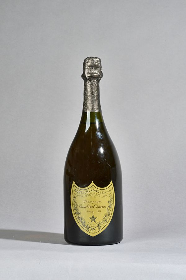 One bottle 1975 Dom Perignon vintage champagne.  Illustrated.