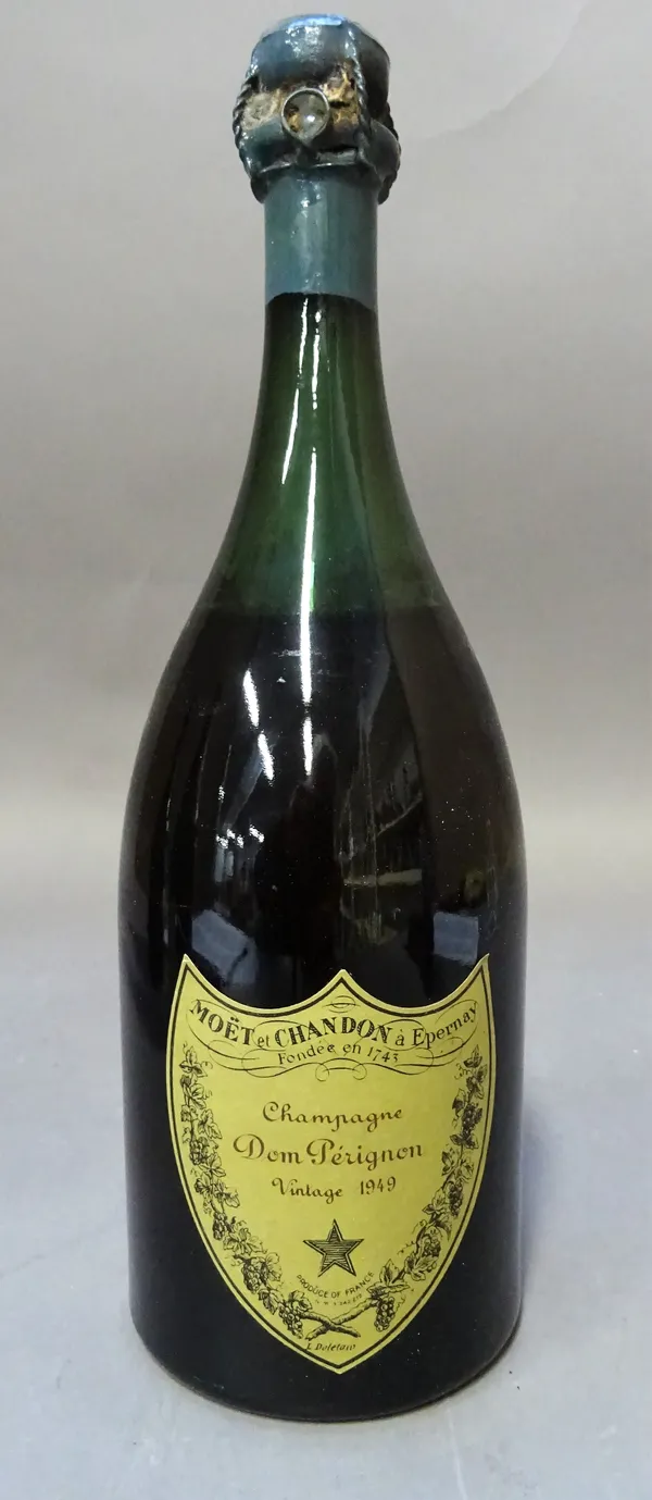 One bottle of 1949 Dom Perignon Vintage Champagne. (Level at high shoulder, re-labeled and re-capsuled).