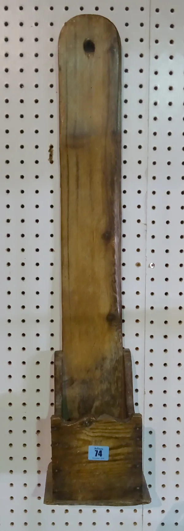 A Welsh pine grit holder/ knife sharpener, probably 18th century, 77cm high.   CAB