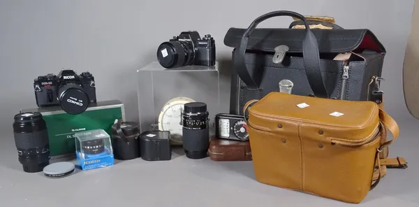 Photographic interest, including; cameras, lenses and accessories, by Ricoh, Praktica and others (qty).   CAB