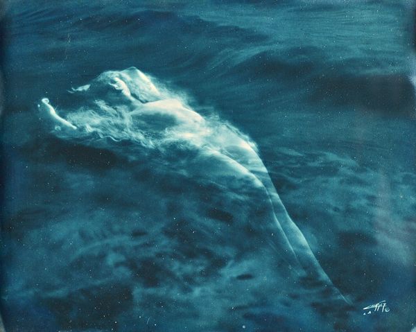 EDWARD SHERIFF CURTIS  (1868 - 1952)  Aphrodite (Spirit of the Sea), ca 1920 - 1930.  blue toned gelatin print, signed, with the Curtis LA studio stam