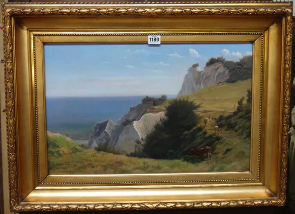 Simon Simonsen (1841-1928), Cattle grazing on a clifftop, oil on canvas, signed and dated 1873, 34cm x 53.5cm.