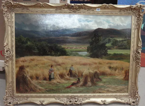 Charles Edward Johnson (1832-1913), Harvesters in a landscape, oil on canvas, signed, 69cm x 100cm.