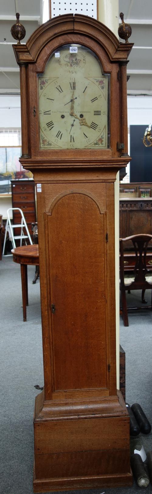 An oak eight day longcase clock, 19th century, the arch top painted dial detailed 'Edwd Tiddeman Canterbury', with subsidiary seconds dial and two tra