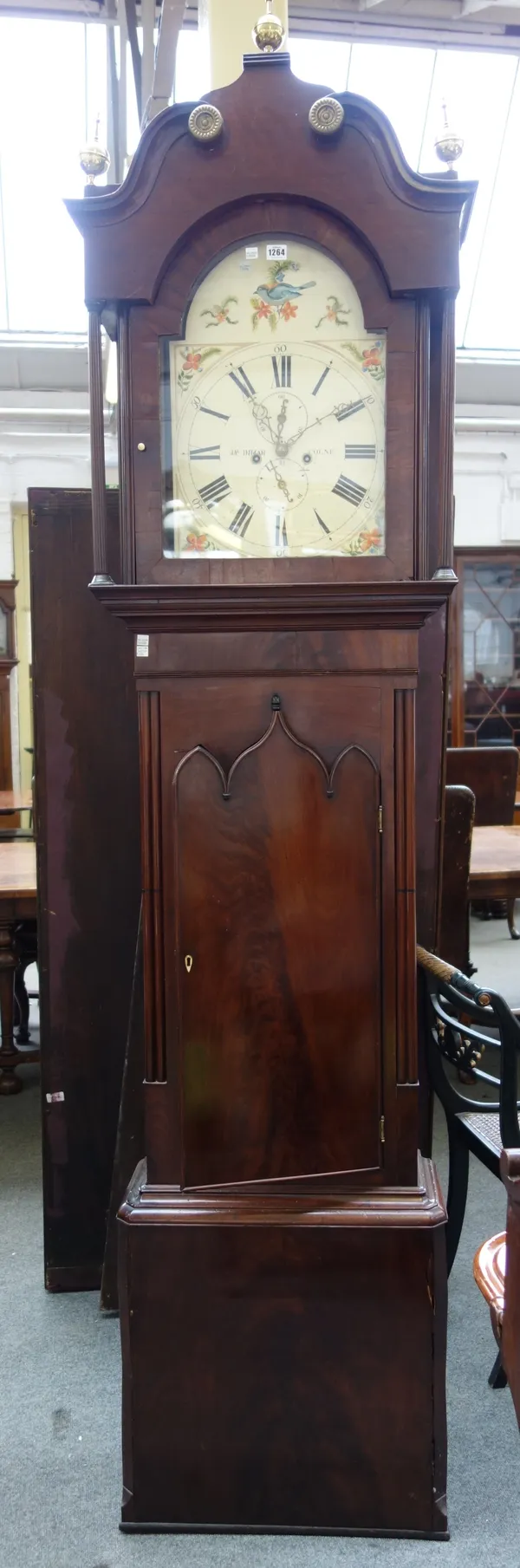 A William IV mahogany eight day longcase clock, JAS Inman, Colne, the swan neck pediment above an arched painted dial, with twin train movement, above