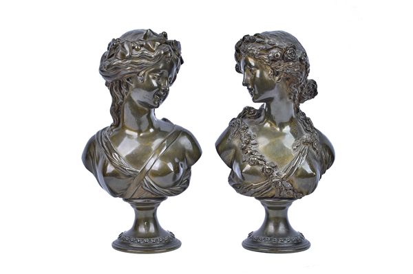 A pair of patinated bronze busts, 19th century, each depicting a classical lady on a socle, one signed 'Marin', the other 'L.V.E. Robert', 22cm high,