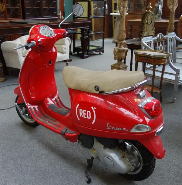 A Vespa "Red" LX125 3 Valve le, unregistered scooter, with no paperwork of any description, 3 kilometres on the mileage display, sold as seen, (1 key)