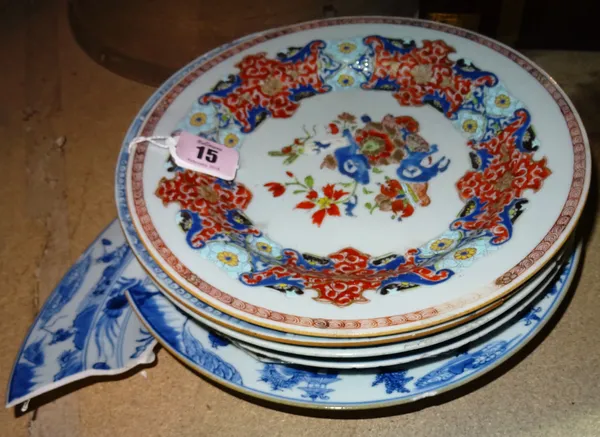 A Chinese famille-rose plate, Qianlong, painted with a central vase, bowl of fruit and flowers, 23cm. diameter; also six blue and white plates includi