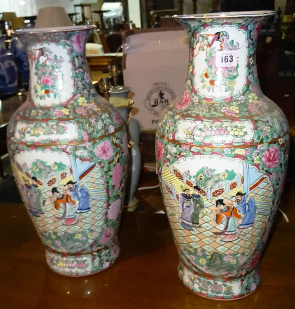 A large pair of 20th century Chinese style famille rose pattern vases, (2).  K2