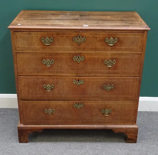 A mid-18th century walnut chest of four long graduated drawers, on bracket feet, 93cm wide x 93cm high x 50cm deep.