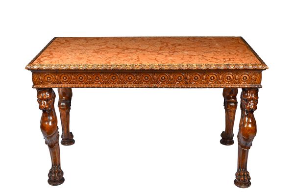 A 17th century Italian style centre table, 19th century, the rectangular inset marble top within a carved rosette frieze, on four lion monopodia suppo