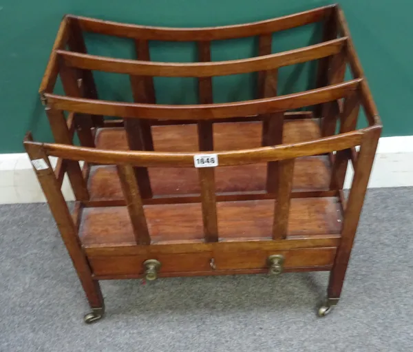 A Regency mahogany Canterbury, with concave triple division over single drawer, on tapering square supports, 48cm wide x 48cm high x 33cm deep.