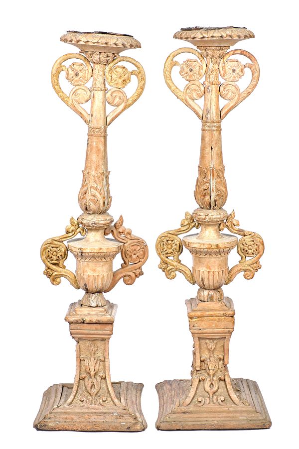 A pair of 18th century and later Italian carved limewood jardiniere stands, on stepped square bases, 40cm wide x 148cm high, (2).  Illustrated