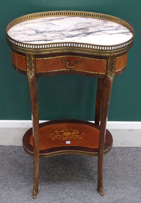 An early 20th century French gilt metal mounted mahogany étagère, the kidney shaped marble top over single drawer, united by platform undertier, 46cm