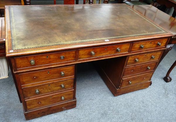 A George III mahogany partners pedestal desk, with nine drawers about the knee and matching opposing, on plinth base, 146cm wide x 90cm deep x 77cm hi