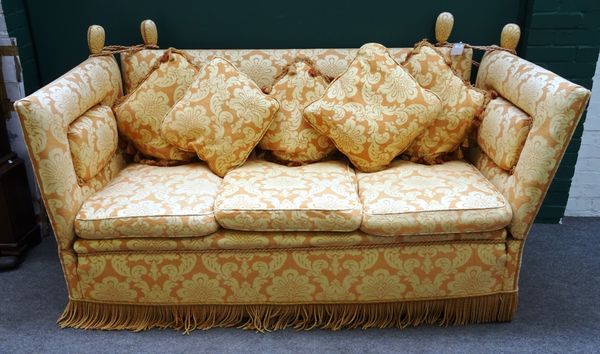 A 20th century Knoll style sofa in patterned peach upholstery, with five scatter cushions, 203cm wide x 100cm high x 95cm deep.