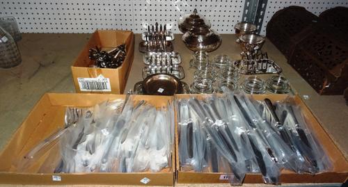 Silver plated wares designed by Theo Fennell comprising; toast racks and crumb trays, two lidded pots and a large quantity of dinner knives, lobster c