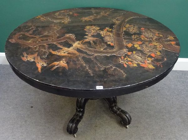 A late 19th century black lacquer chinoiserie decorated circular centre table, on bulbous turned column and four downswept supports, 118cm diameter x