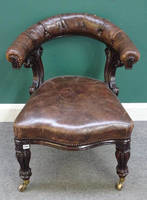 A William IV mahogany open tub back library chair, with serpentine seat on baluster reeded supports, 70cm wide x 80cm high.